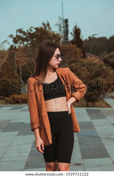 files/girl-dark-hair-sunglasses-brown-600w-1929711122.webp